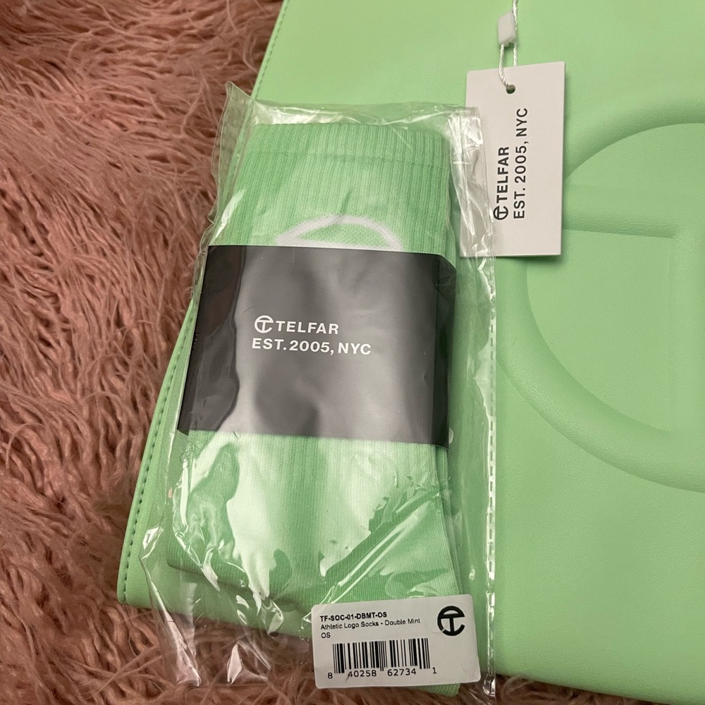 Authentic Telfar purse and matching sockss never used or worn.